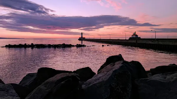 Duluth harbor at sunset with lighthouse pier