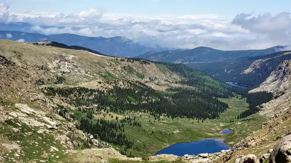 High alpine valley with mountain lakes and forests, Colorado